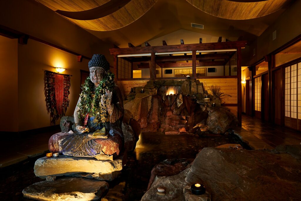 A water feature and Buddha statue at Shibui Spa at FivePine Lodge in Sisters, Oregon.