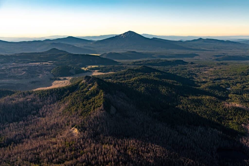 peaks and mountain tops, miles of evergreen forests as far as the eye can see