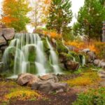 Falls beside a Sunriver logo