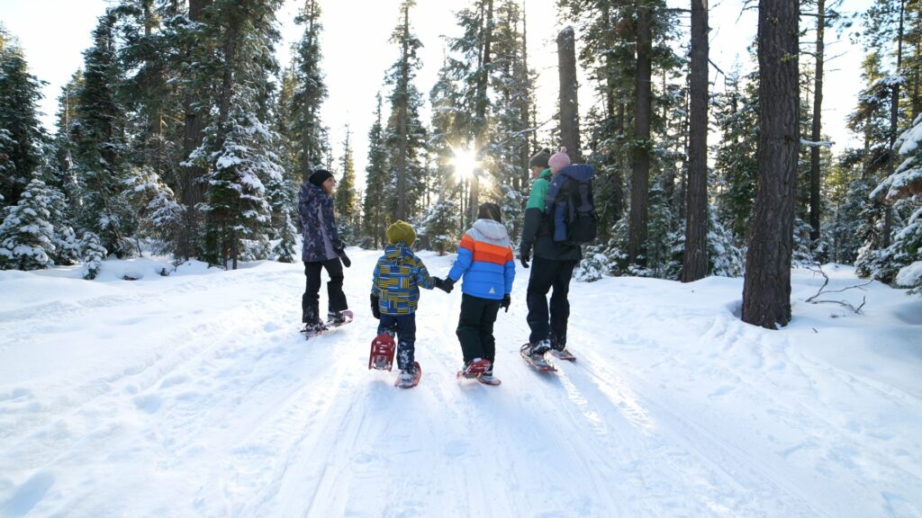 Family snowshoeing in the Deschutes National Forest at Mt. Bachelor