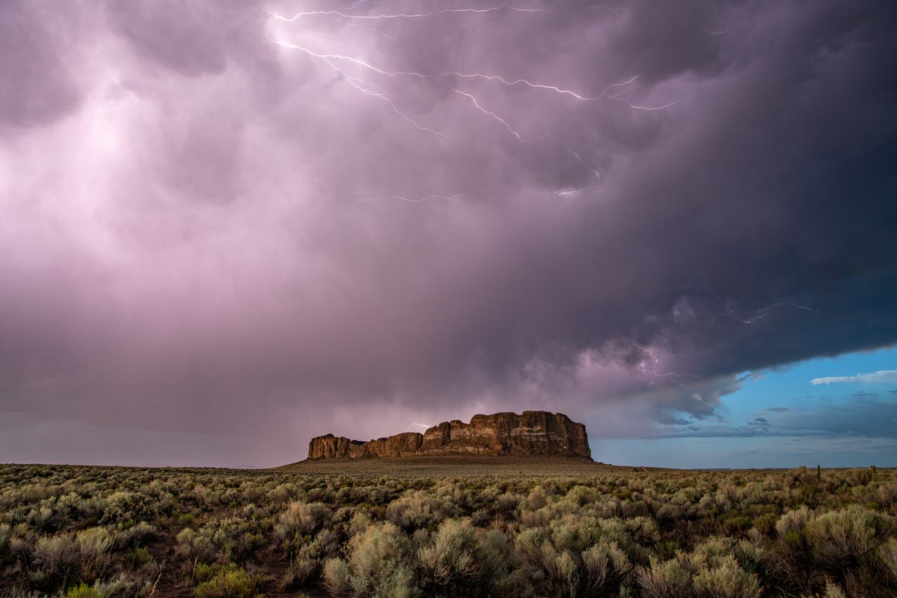 Lighting strikes over Fort Rock State Park in the high desert near La Pine, Oregon.