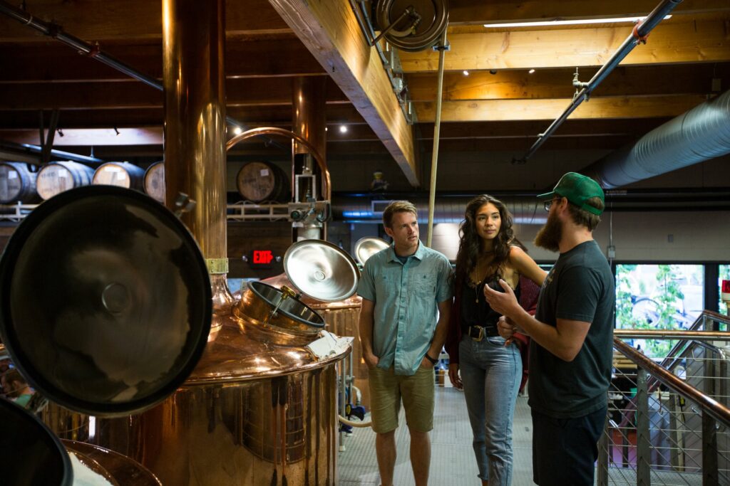 a couple getting a brew tour at Crux, Bend, OR