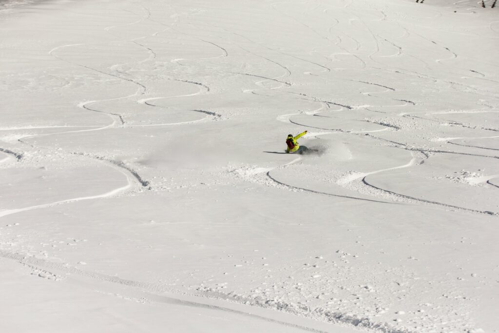 Man backcountry snowboards near Bend, Oregon