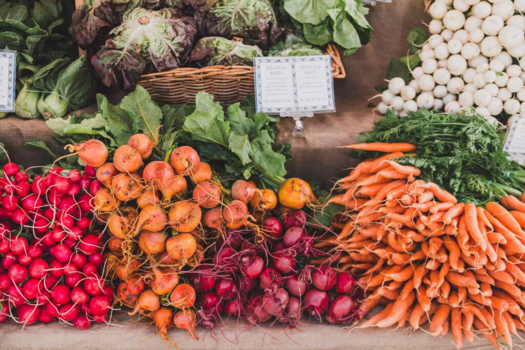 a colorful collection of veggies from the Bend Farmers market