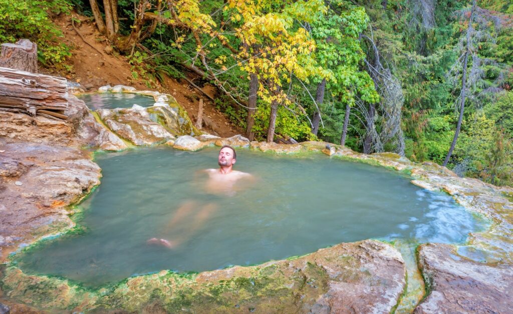 a man resting is hot springs
