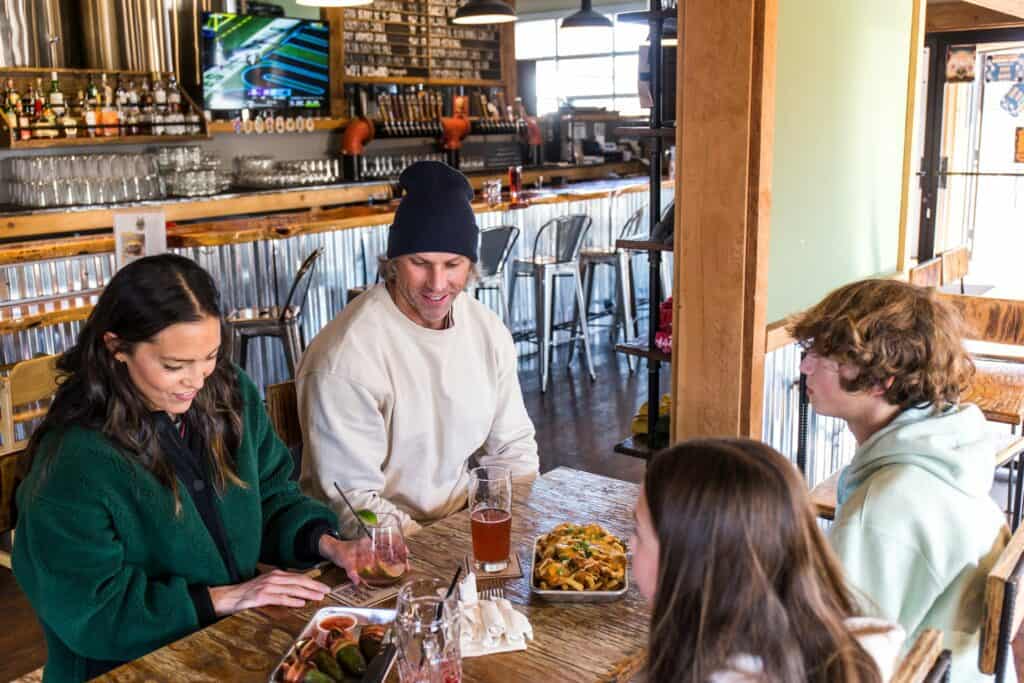 A family dines at Wild Ride Brewing in downtown Redmond in Central Oregon