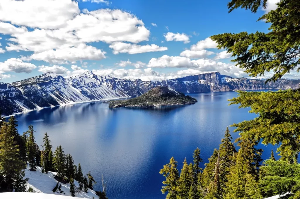 Landscape image of Crater Lake in the snow.