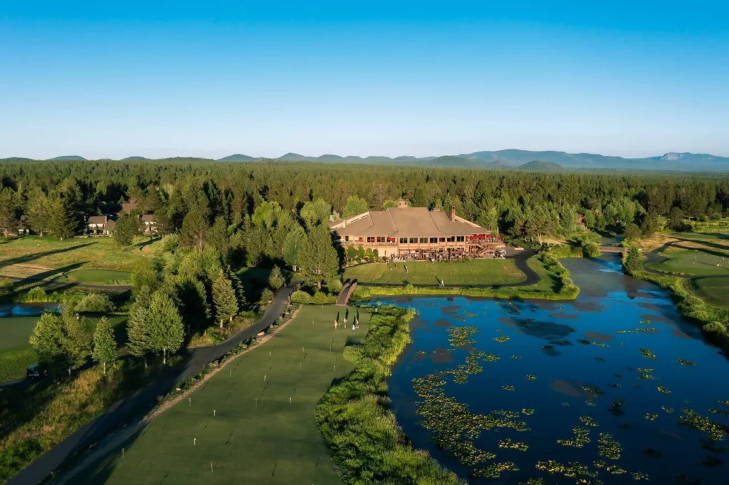 aeriel of Sunriver resort surrounding by pines and snow