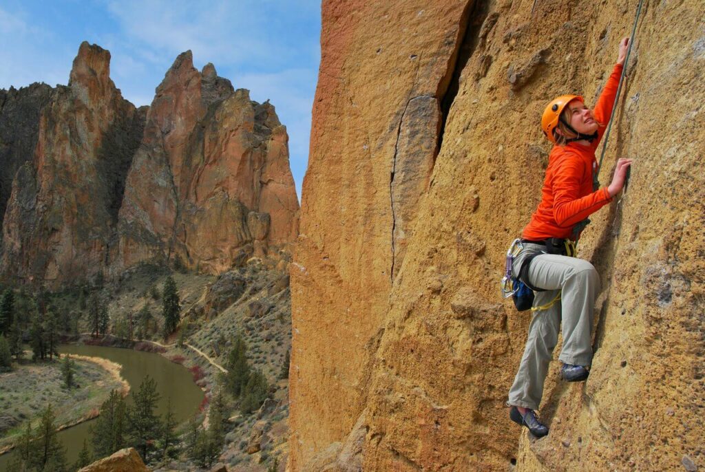 A climber over the river at Smith Rock.