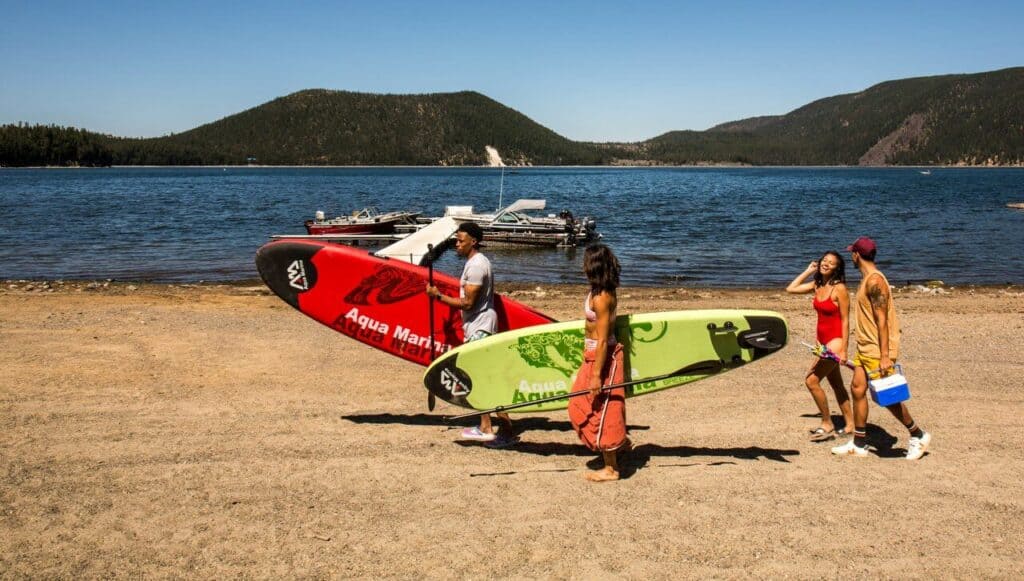 People prepare to SUP. 