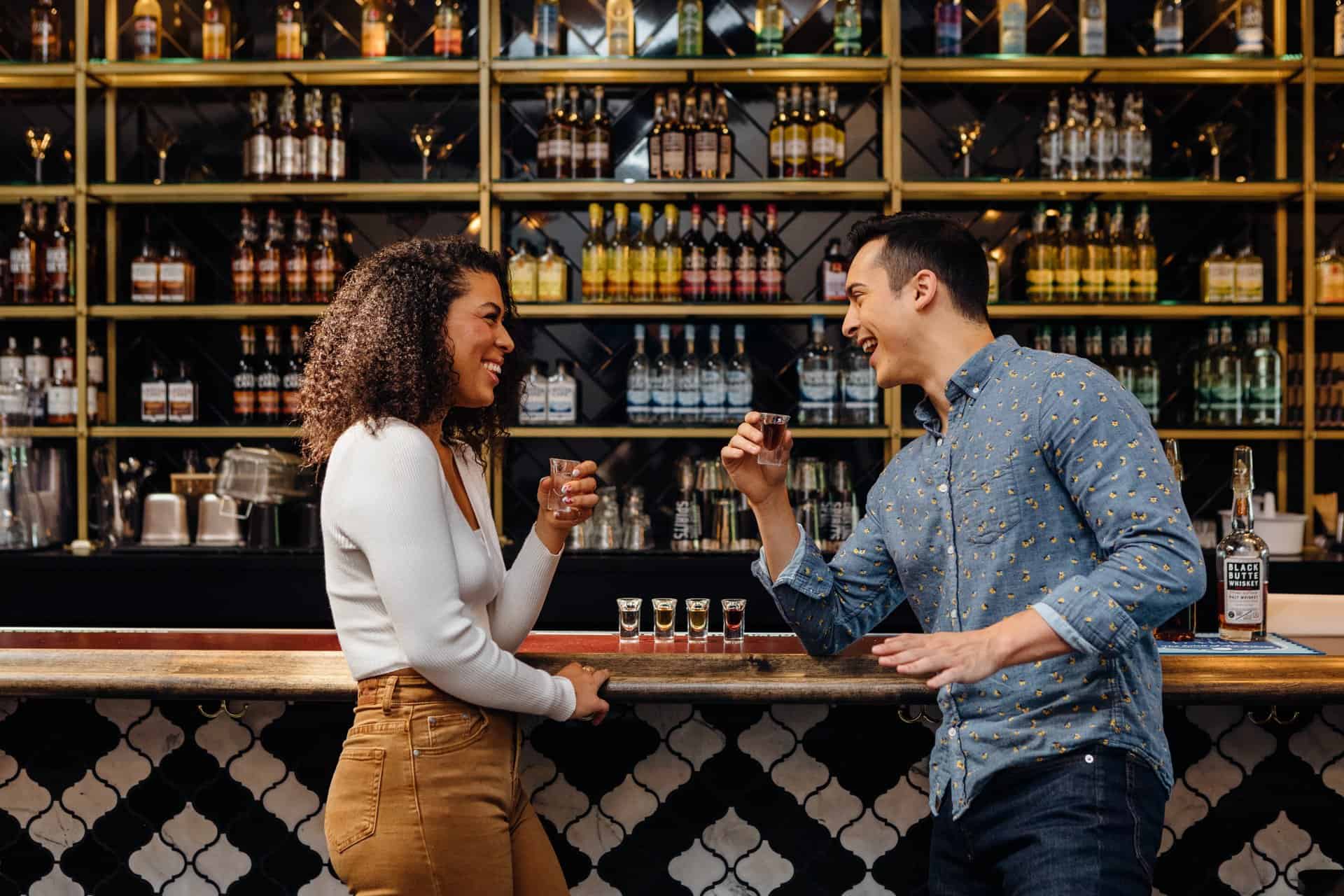 A couple enjoys a drink at Crater Lakes Spirits