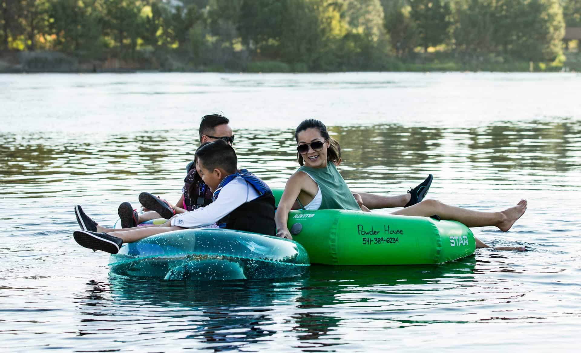 A family floats on the Deschutes River