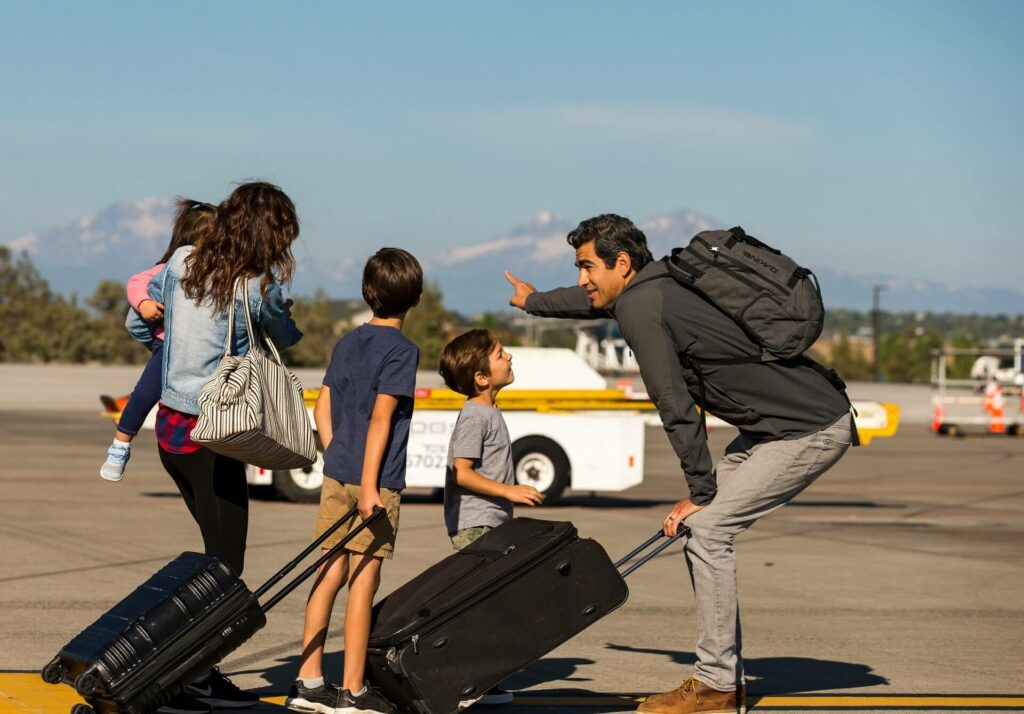 A family at Redmond Municipal Airport in Oregon