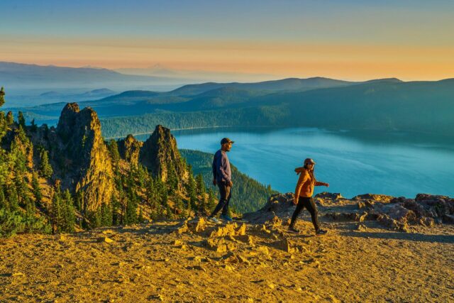Couple hiking above Paulina Lake.