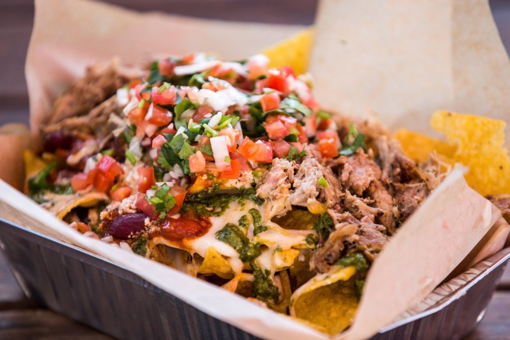 Plate of carnitas nachos at Luckey’s Woodsman in Sisters, Oregon