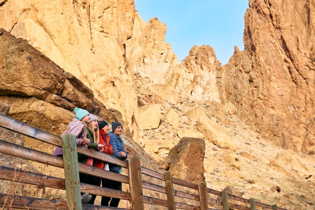 Family hiking at Smith Rock State Park near Redmond, Oregon