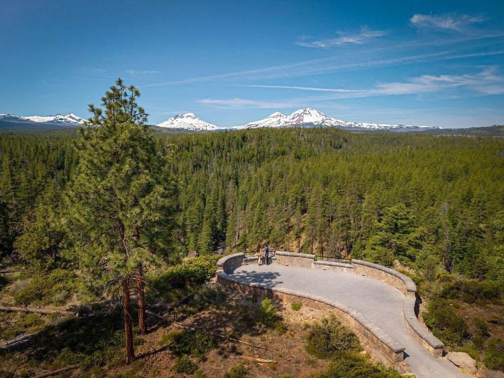 Aerial view of a couple hikers on the Whychus Creek Overlook Trail near Sisters, Oregon
