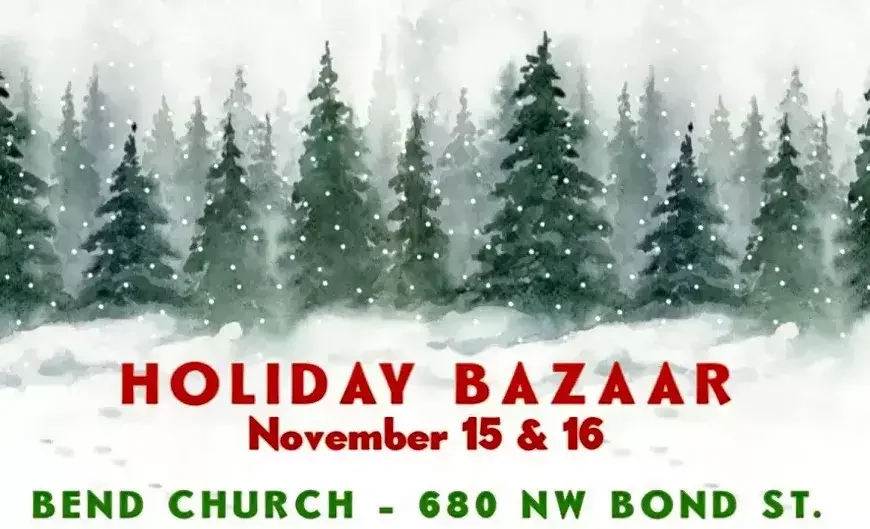 A festive holiday bazaar with snow-covered trees and a snowy landscape in Central Oregon.