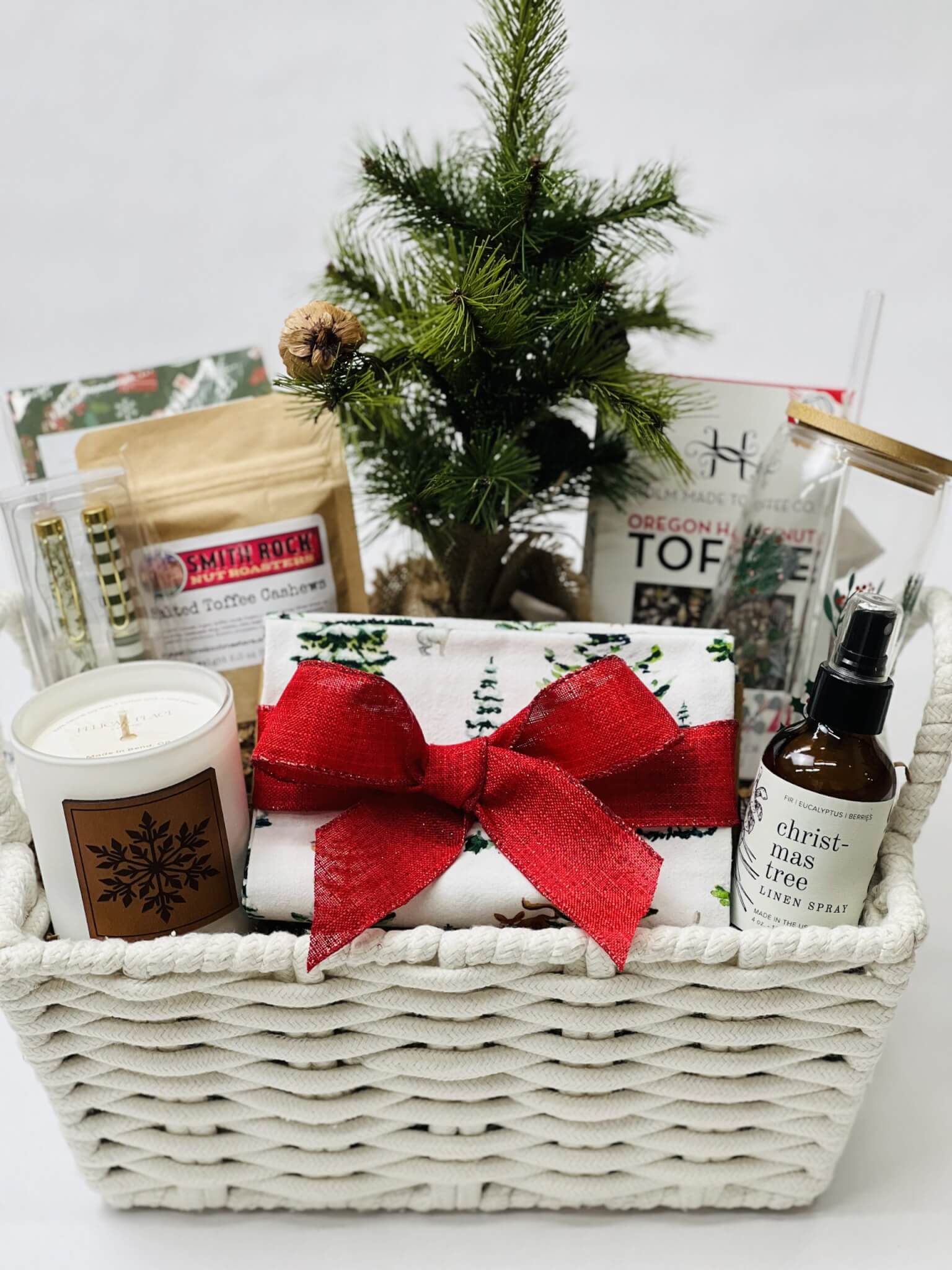A festive holiday gift basket filled with holiday-themed items in Central Oregon.