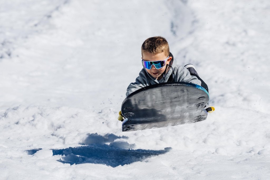 Sledder catches air at the Autobahn Tubing park near Hoodoo Ski Area in Oregon