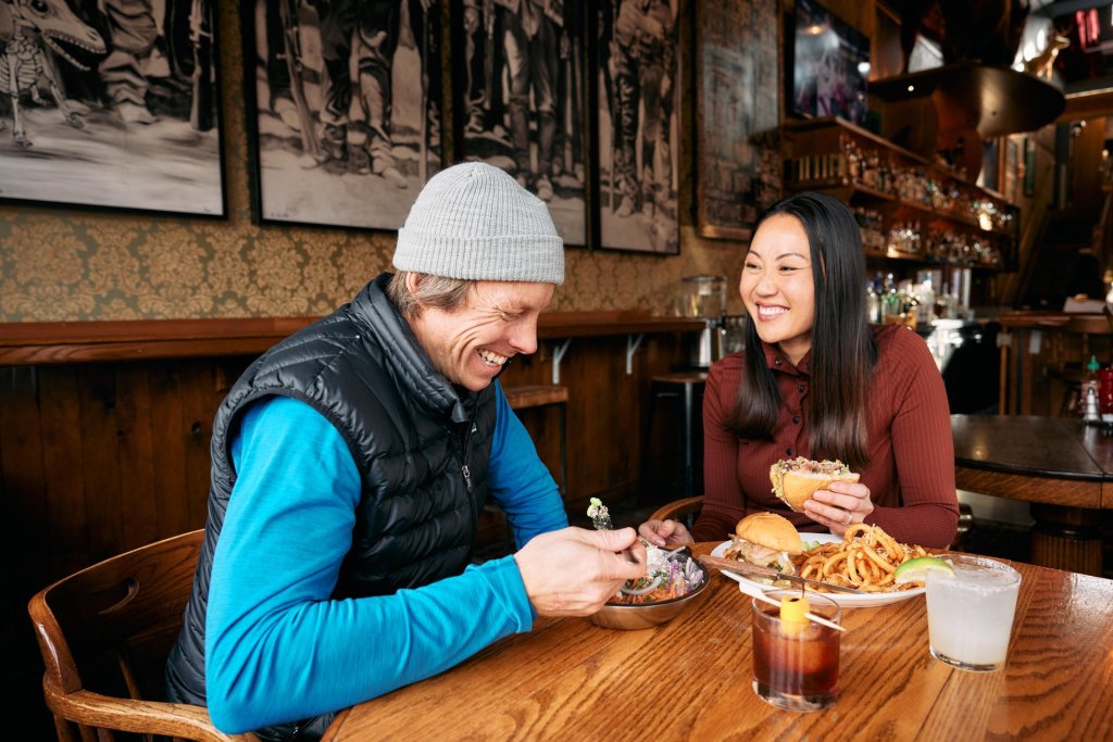 Couple enjoys a meal at McMenamins in Bend, Oregon