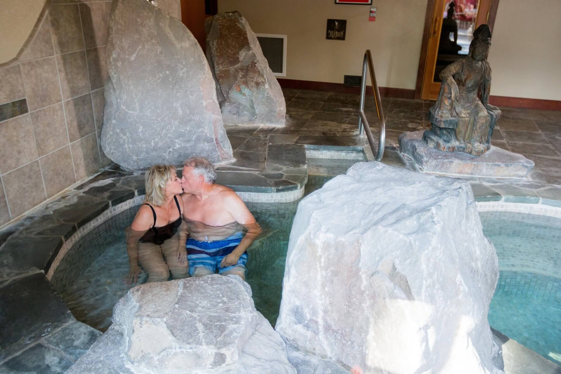 Couple in the hot tub at Shibui Spa at FivePine Lodge in Sisters