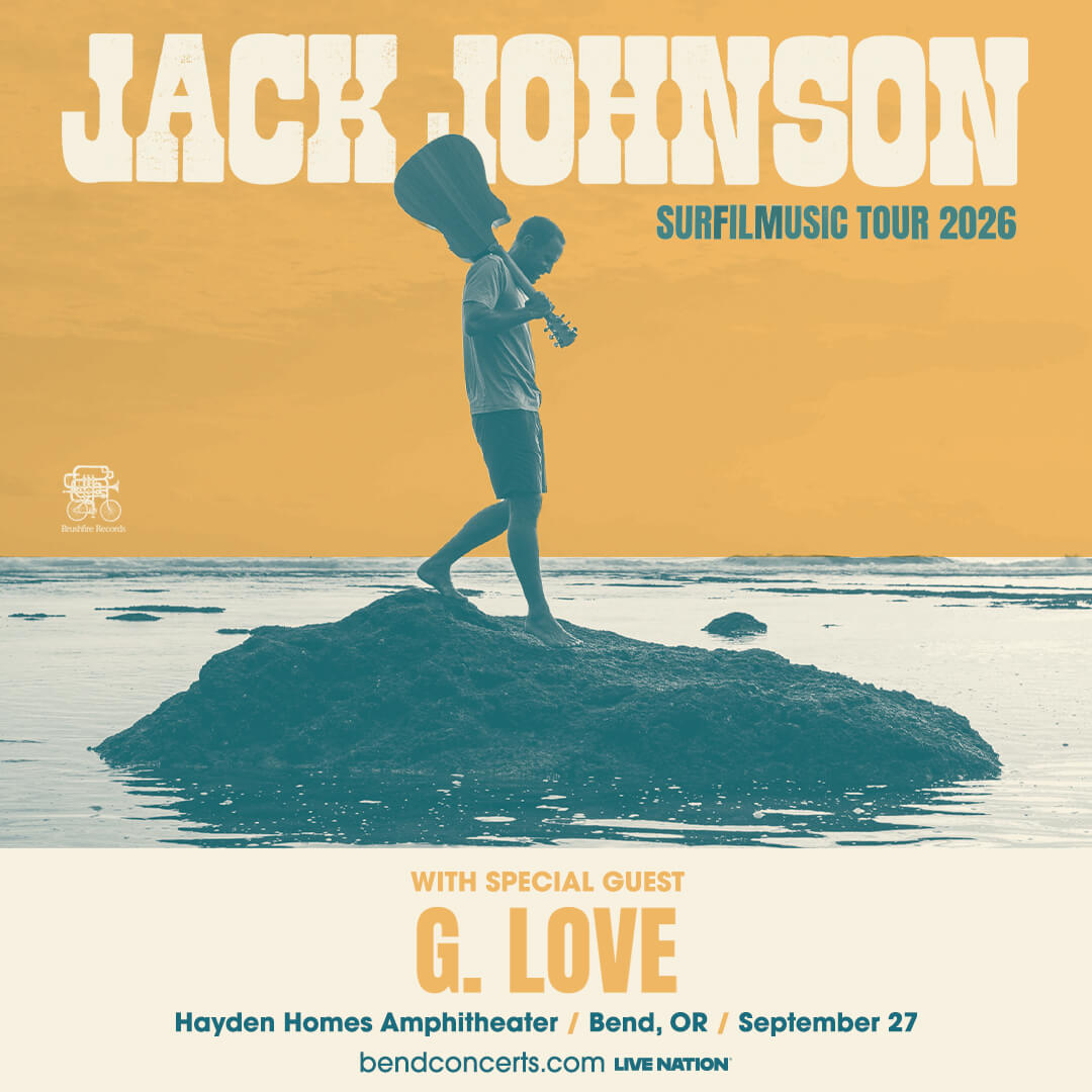 Jack Johnson on a beach, holding a guitar, promoting his Surfmusic Tour 2026 in Central Oregon.