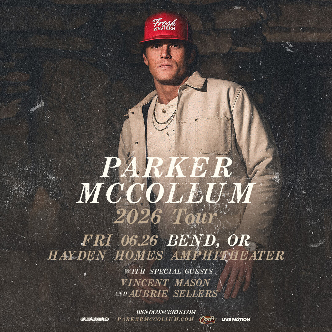 Parker McCollum wearing a red hat, standing in front of a brick wall, promoting his 2026 tour in Central Oregon.