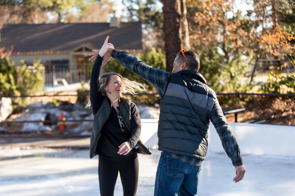 Couple ice skates outside of Bend, oregon