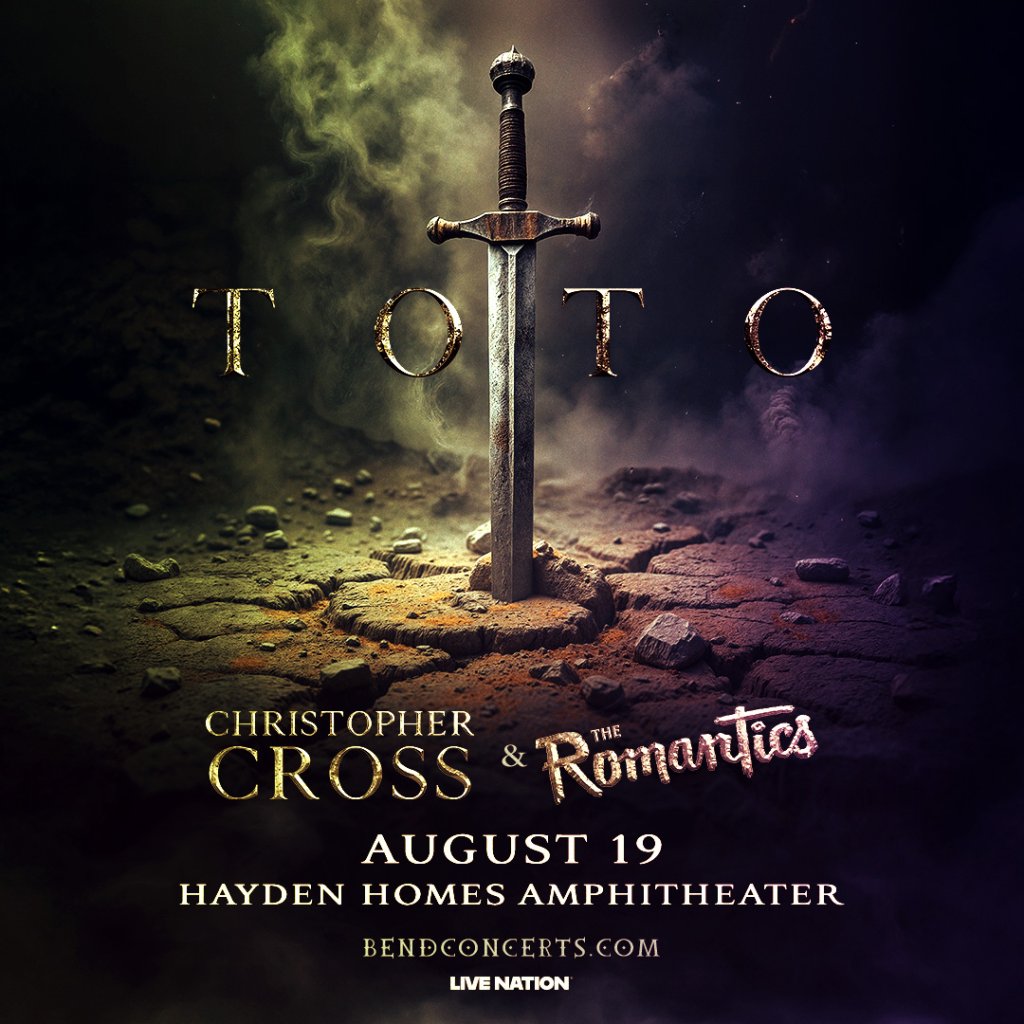 A dramatic scene featuring a sword on a rocky terrain with text promoting a concert in Central Oregon.