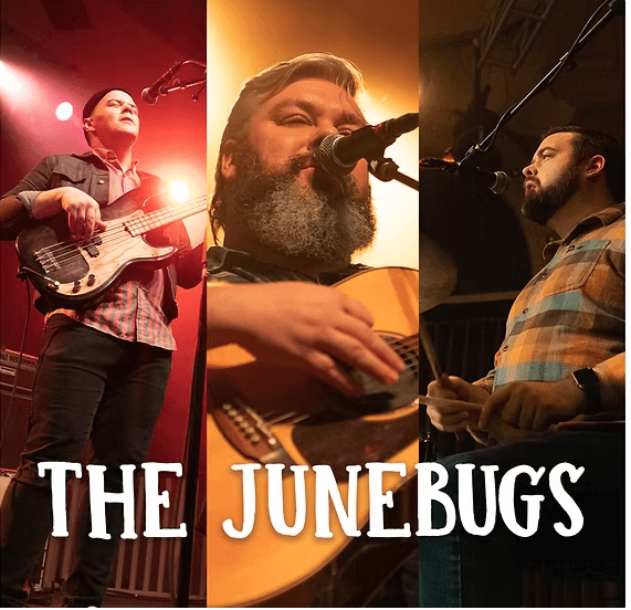 Three musicians performing on stage, with the lead singer and guitarist in the center, and the drummer on the right in Central Oregon.