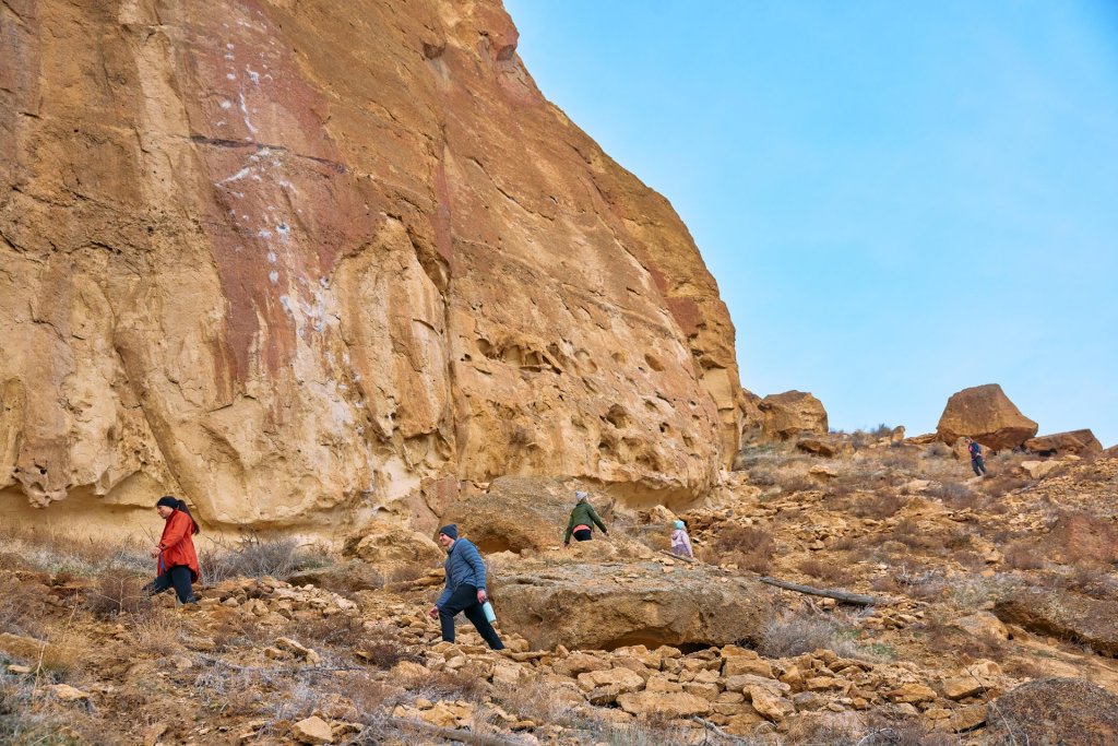 Family hiking the Misery Ridge Trail Loop at Smith Rock State Park near Terrebonne, Oregon