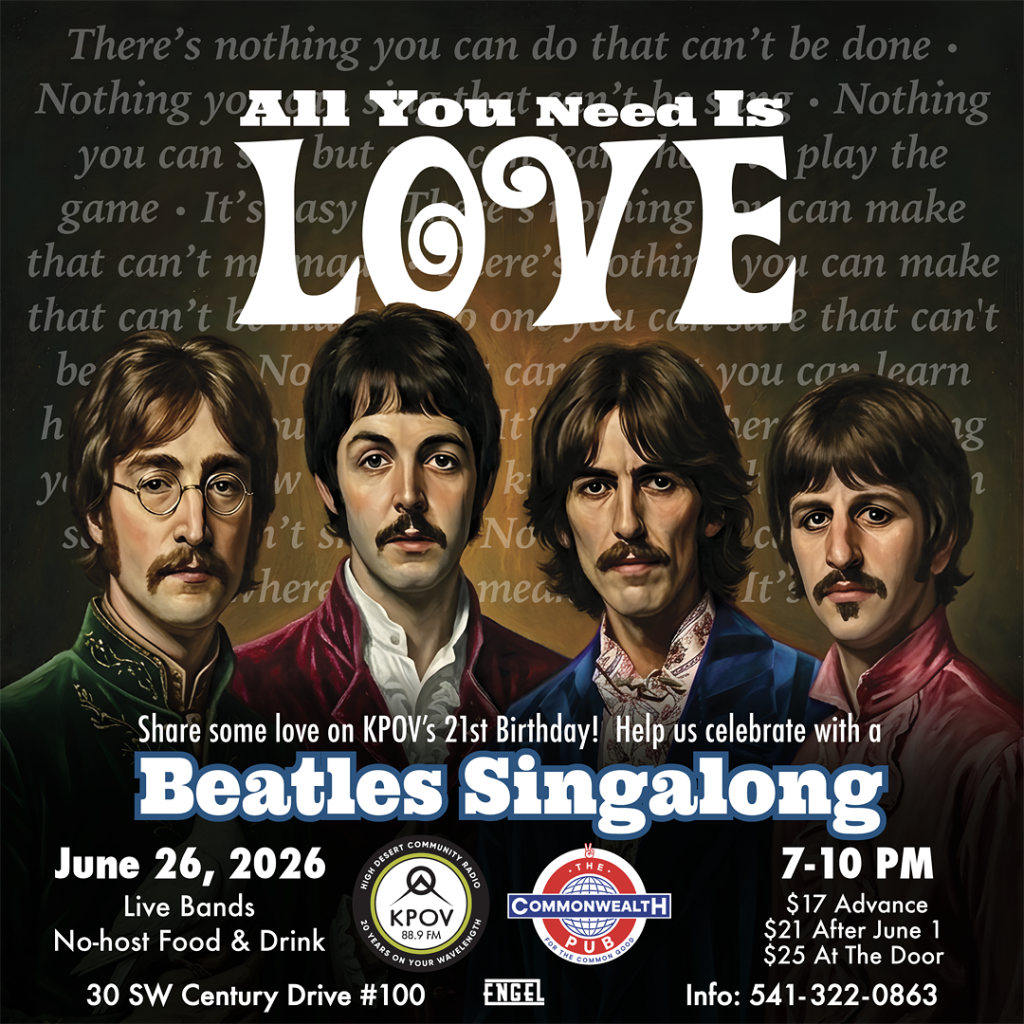 Four men dressed in colorful suits sing together, celebrating a birthday with a Beatles Singalong event in Central Oregon.