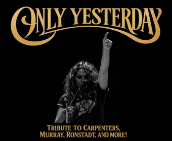 A musician with long hair passionately playing the violin on stage, paying tribute to legendary bands in Central Oregon.