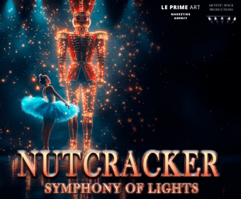 A majestic nutcracker soldier stands tall, illuminated by sparkling lights, with a ballerina in a blue tutu at his side, set against a starry night sky in Central Oregon.