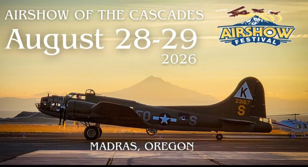 A vintage B-25 Mitchell bomber on a runway at sunset, with mountains in the background, advertising the Airshow of the Cascades in Madras, Oregon in Central Oregon.