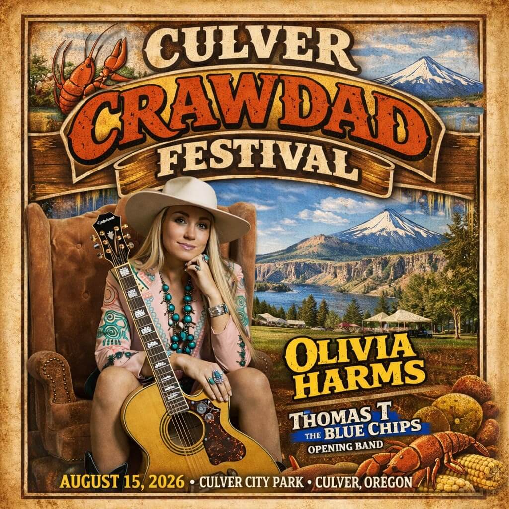 A woman in a cowboy hat and colorful jewelry plays an acoustic guitar, promoting the Culver Crawdad Festival with a scenic backdrop of mountains and a lake in Central Oregon.