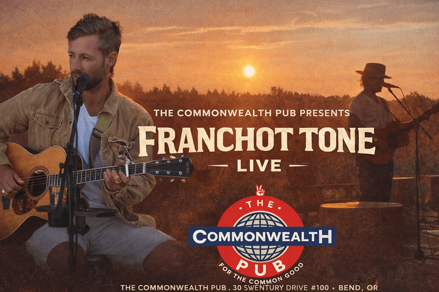 A musician performs live at sunset with an acoustic guitar at The Commonwealth Pub in Central Oregon.