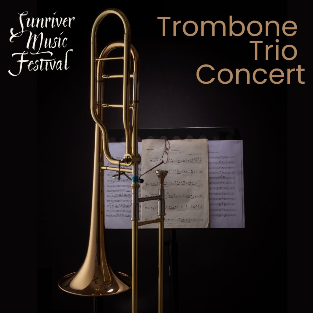 A gleaming trombone stands ready on a music stand, with sheet music and a pair of glasses resting on top, against a dark background in Central Oregon.