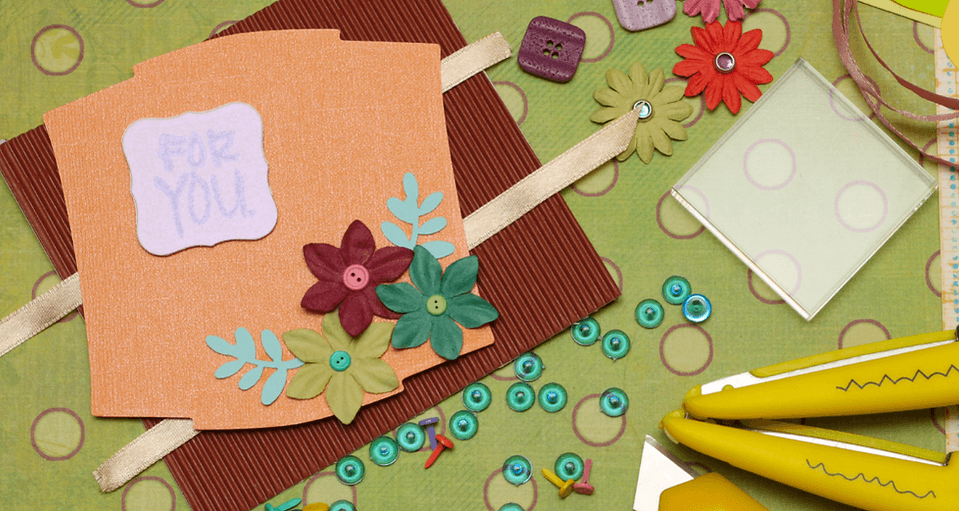 A handmade greeting card with floral decorations and a 'For You' label on a desk in Central Oregon.