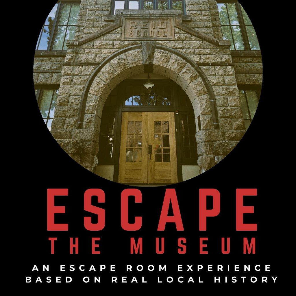 The stone entrance of the historic Reid School building for an escape room experience in Central Oregon.