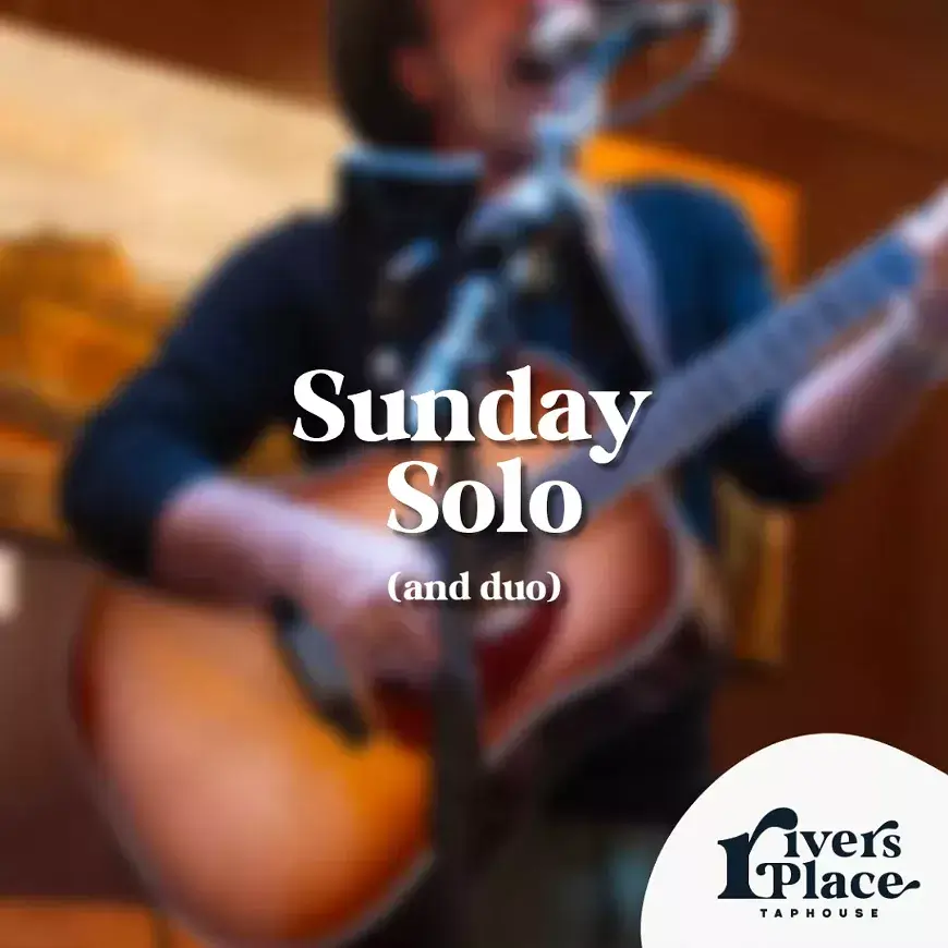 A blurred musician plays an acoustic guitar with text overlaying the image in Central Oregon.