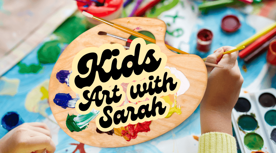 A wooden art palette with colorful paints and brushes held by a child in Central Oregon.