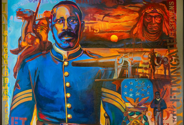 A vibrant painting of a Buffalo Soldier with historical military and Native American imagery in Central Oregon.