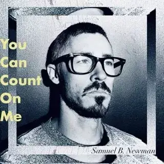 A black and white portrait of a man wearing glasses with text overlay in Central Oregon.