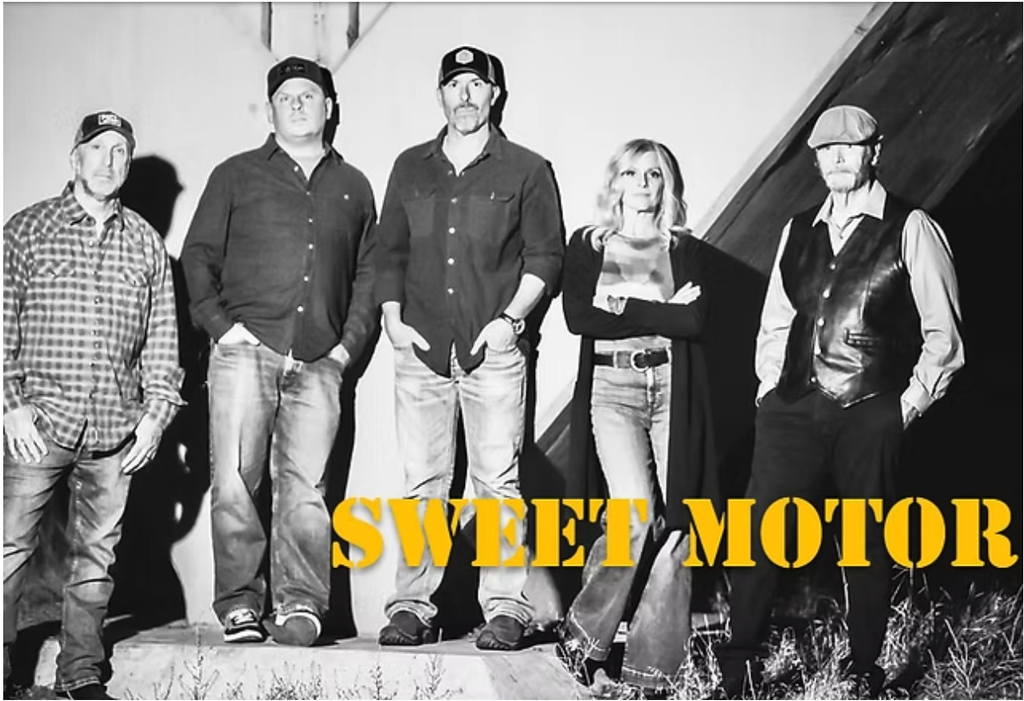 A band of five people posing for a black and white promotional photograph in Central Oregon.