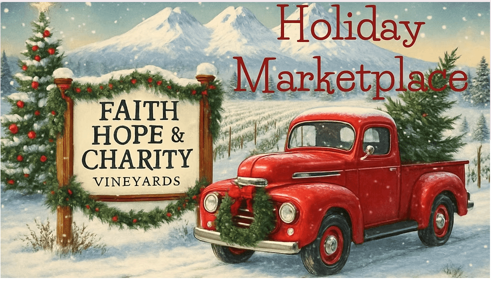 A red vintage truck parked at a snowy vineyard during the holiday season in Central Oregon.