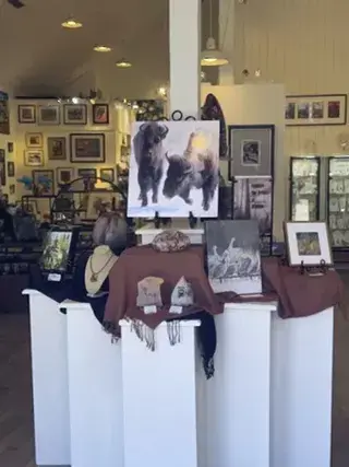 A display of artwork and sculptures in a gallery or shop in Central Oregon.