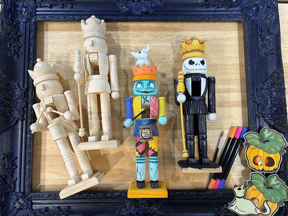 Several nutcrackers, including painted Nightmare Before Christmas characters, inside a dark ornate frame in Central Oregon.